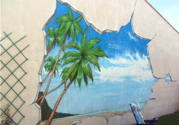 Niort, graffiti d'une façade de 4 mètres avec un paysage paradisiaque
