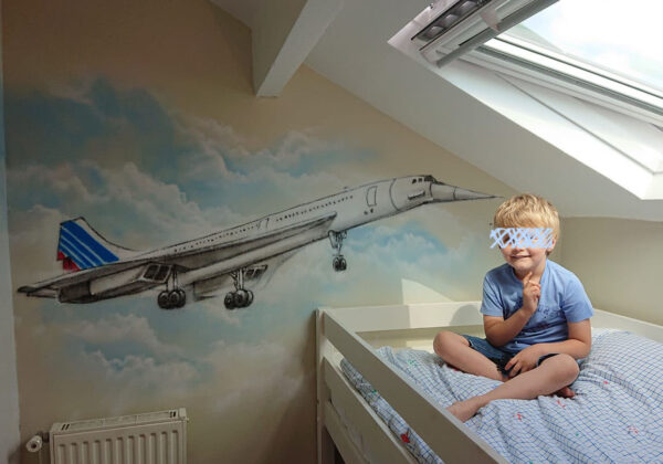 Tag d'un avion sur un mur de chambre